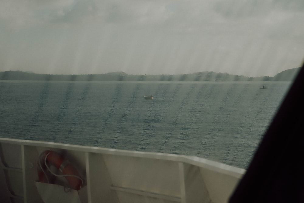 a boat traveling across a large body of water