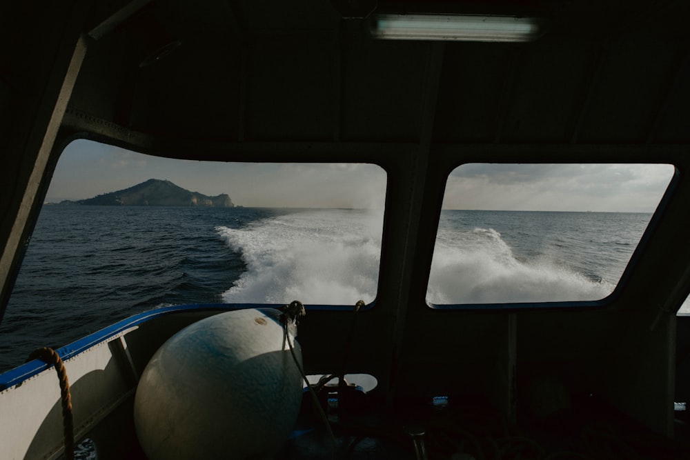 a view of the ocean from inside a boat