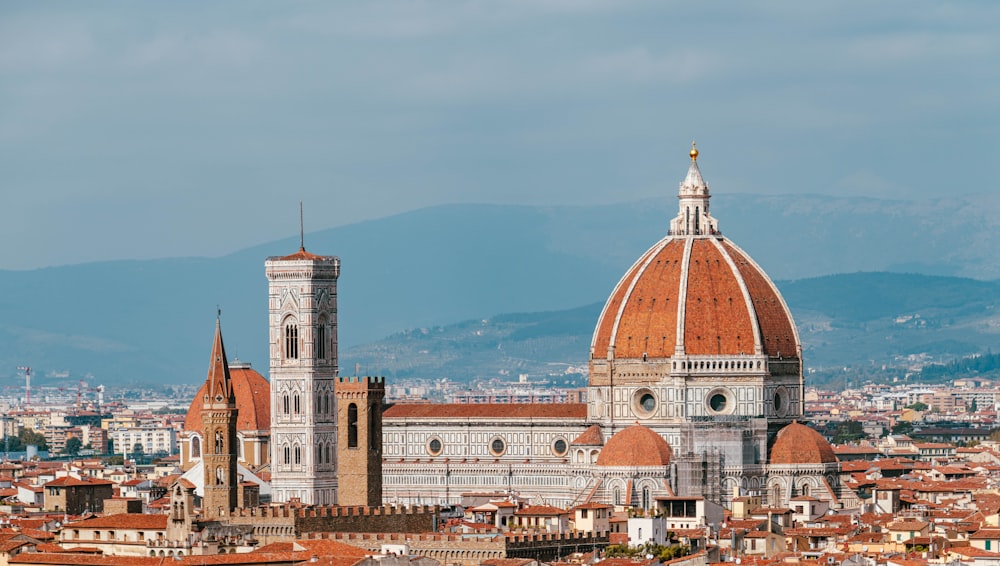 a view of a city with buildings and a dome