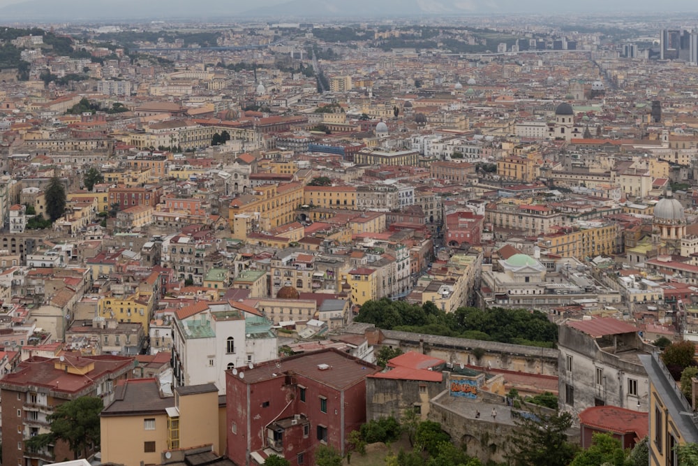 a view of a city from the top of a hill