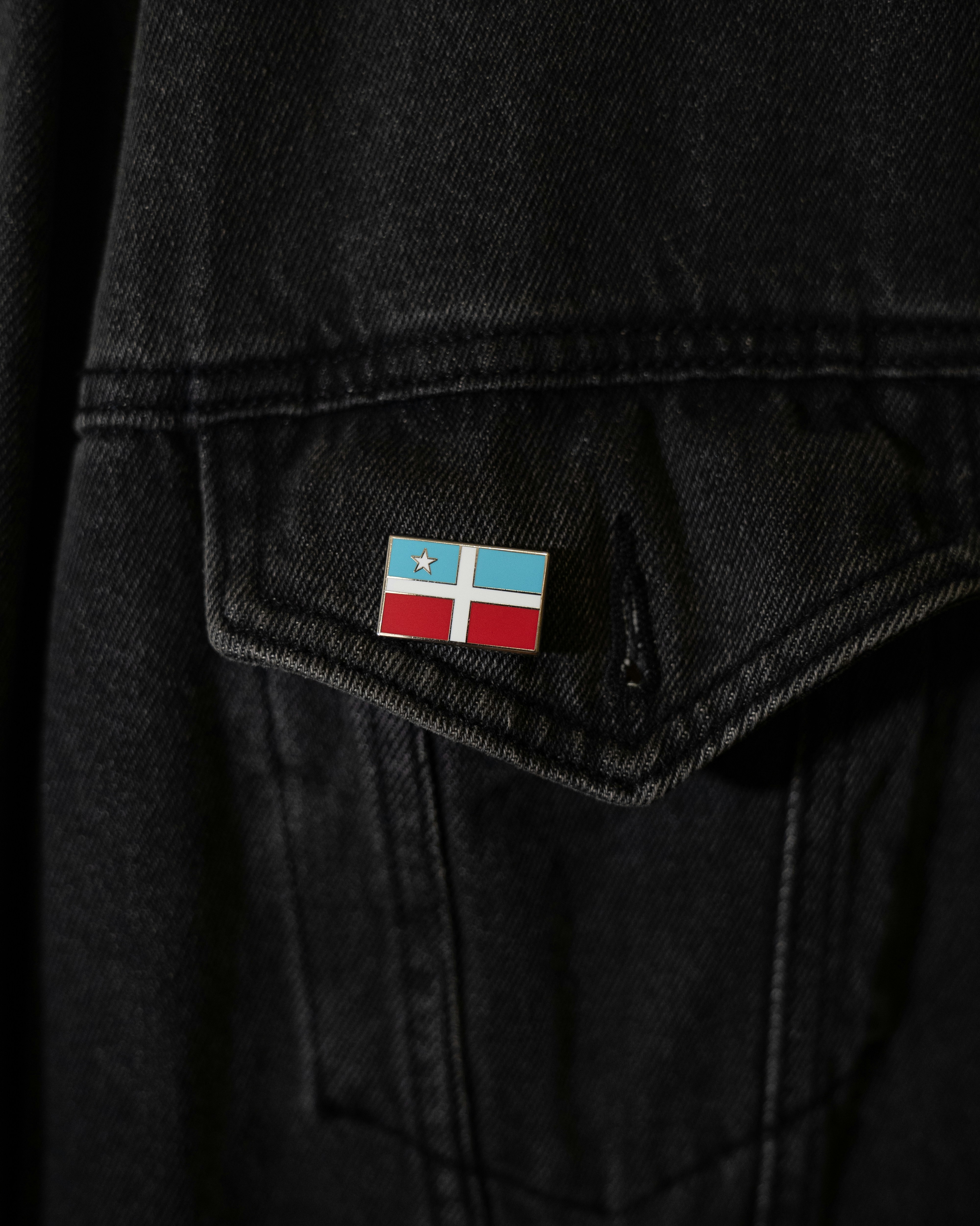 a jacket with a flag on the back of it