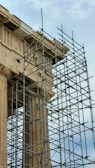 a clock tower with scaffolding around it