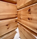 a close up of a pile of wood