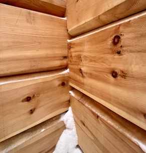 a close up of a pile of wood