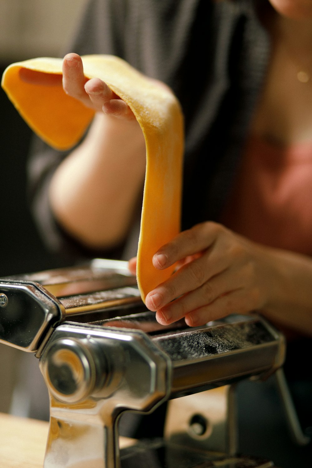 a person is peeling a banana on a machine