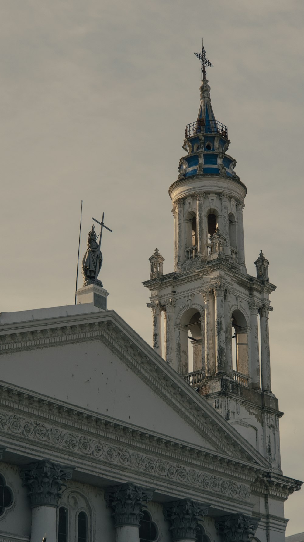 a tall building with a clock on the top of it