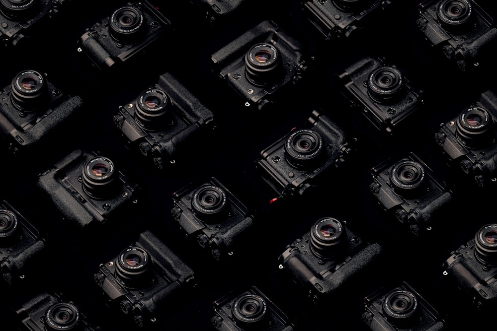 a group of cameras sitting next to each other