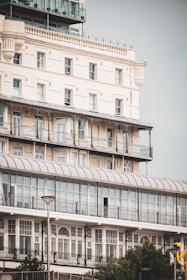 a tall building with balconies on top of it
