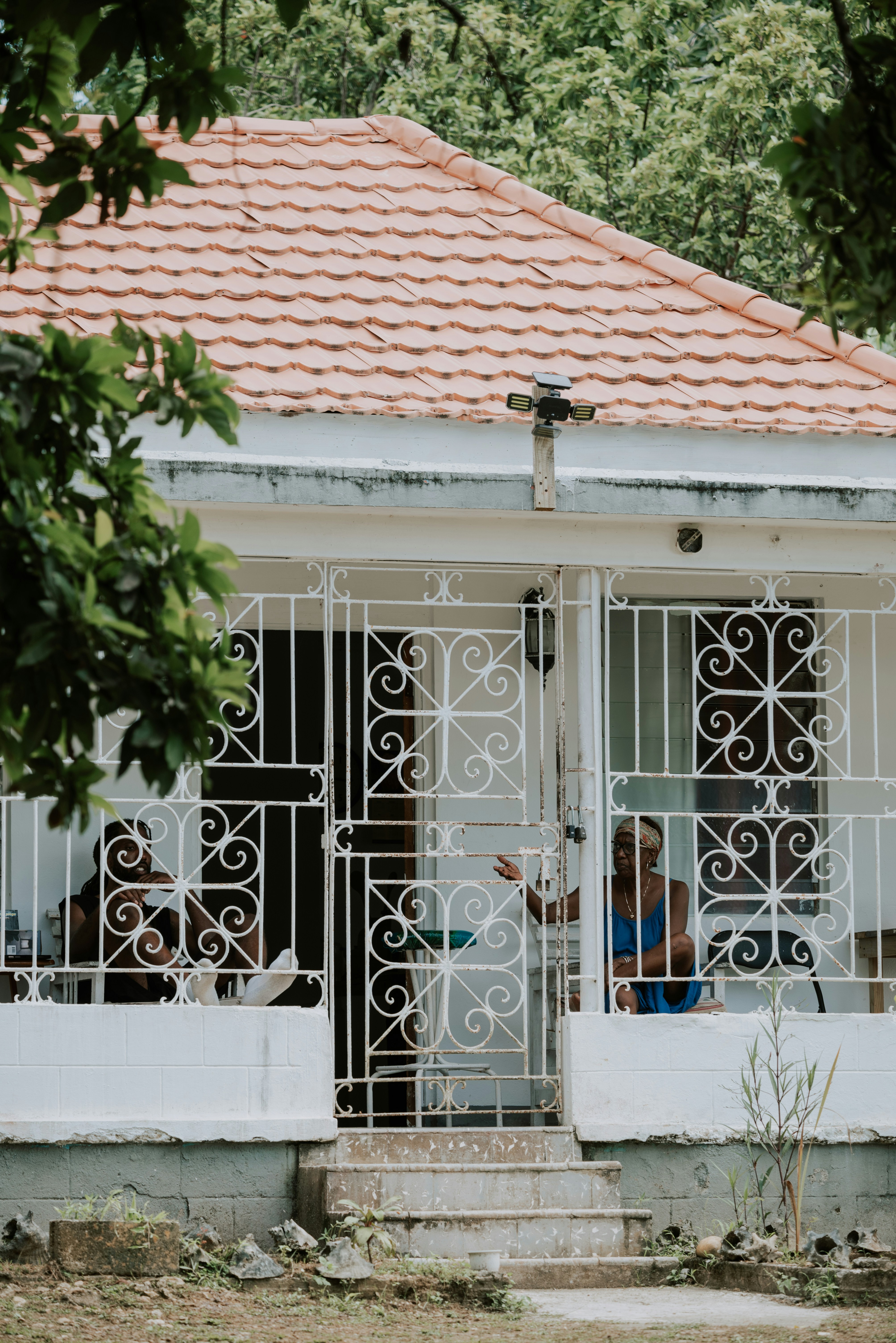 Family outside a repaired home