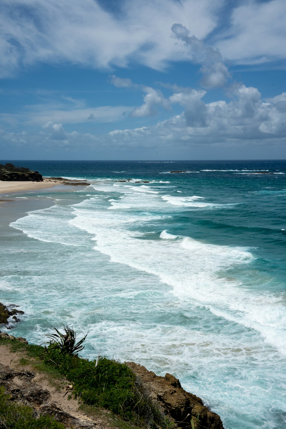 a view of the ocean from a cliff