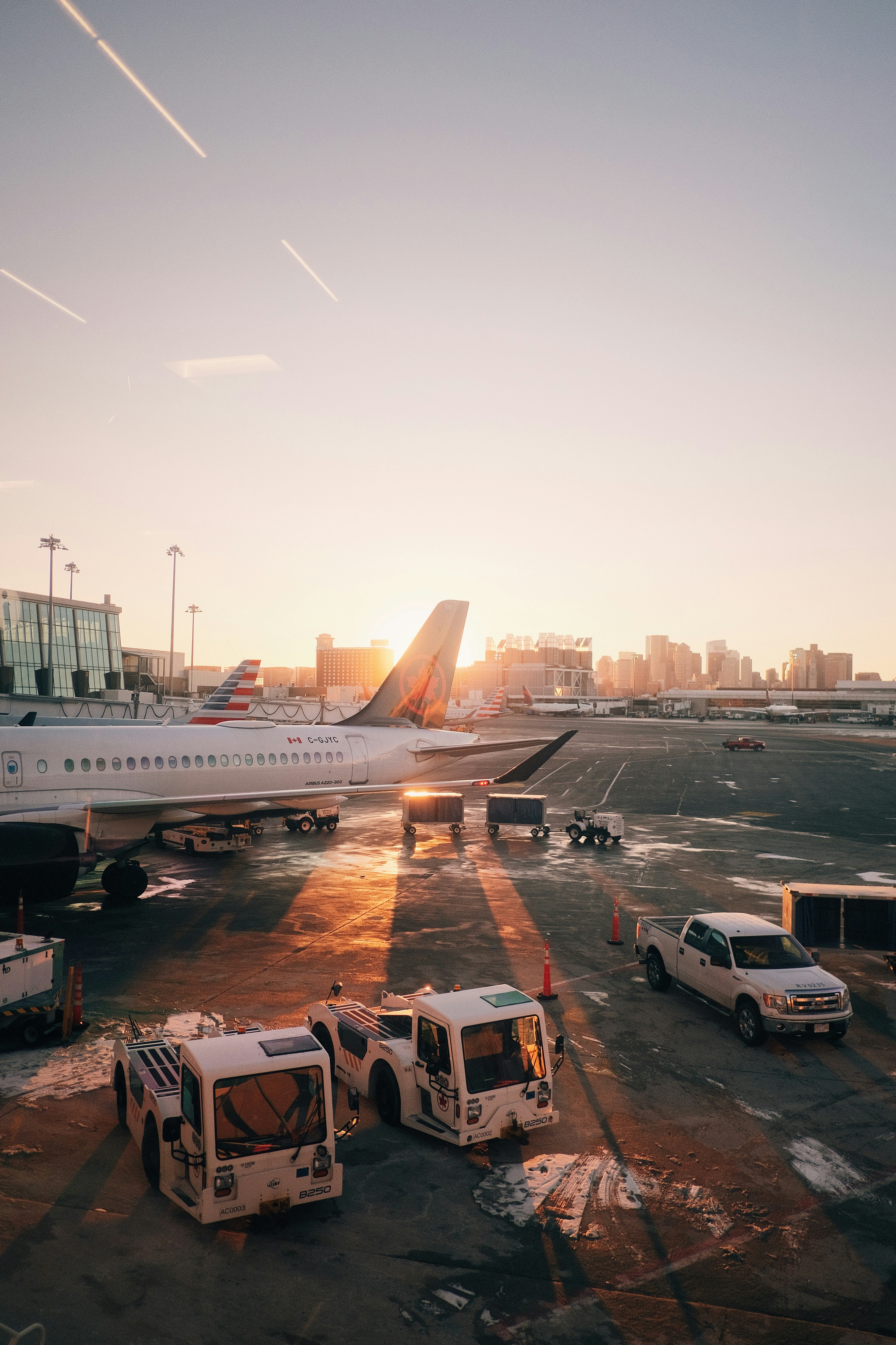 a couple of trucks are parked in a parking lot