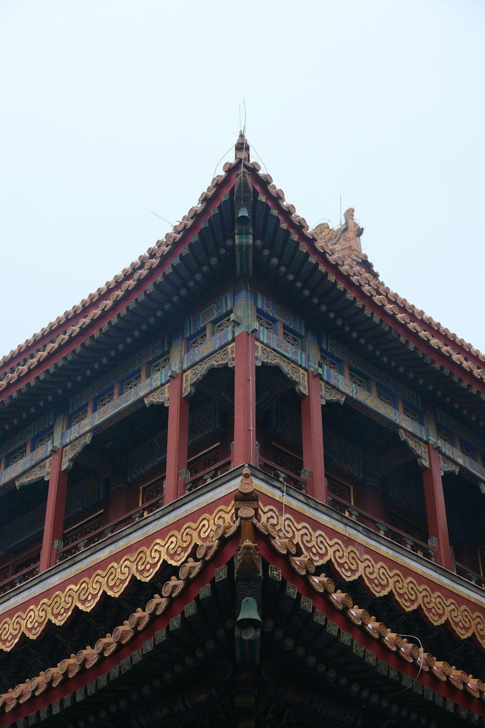 a tall building with a clock on the top of it