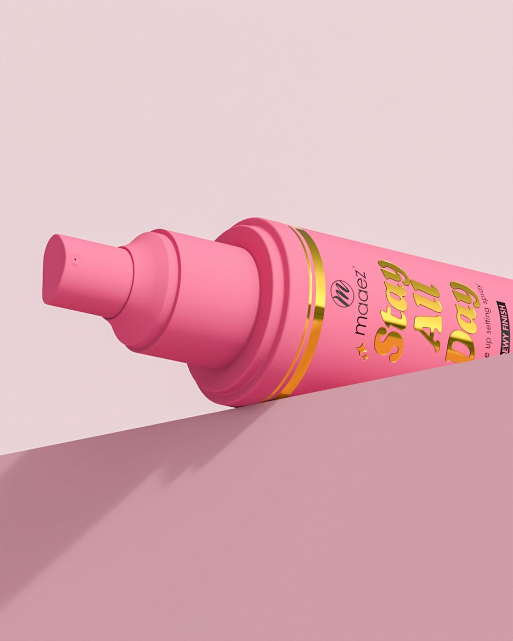 a pink tube of lip bale on a pink background