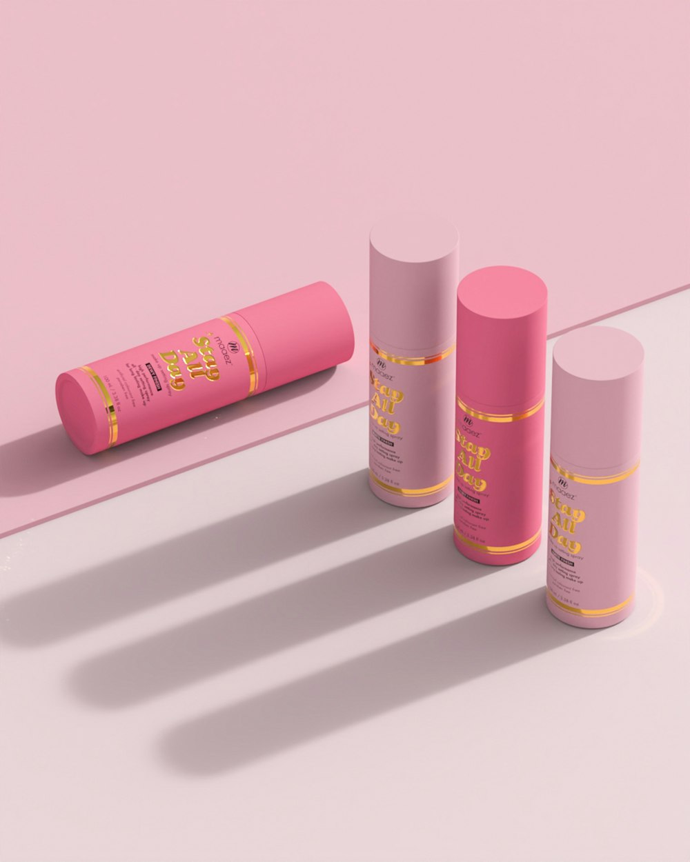 three lip bales and a tube of lip bale on a pink background
