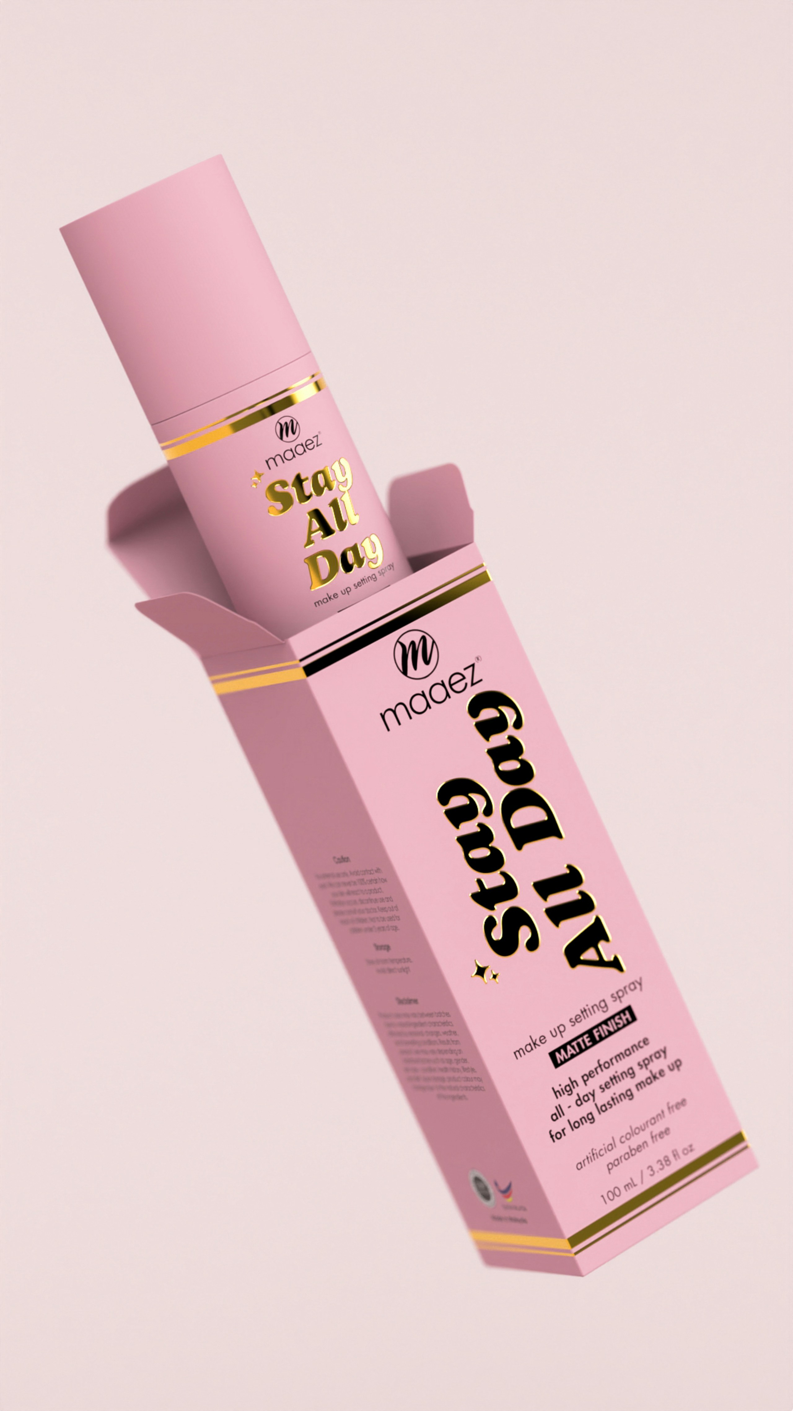 una caja rosa con lámina de oro en la parte superior