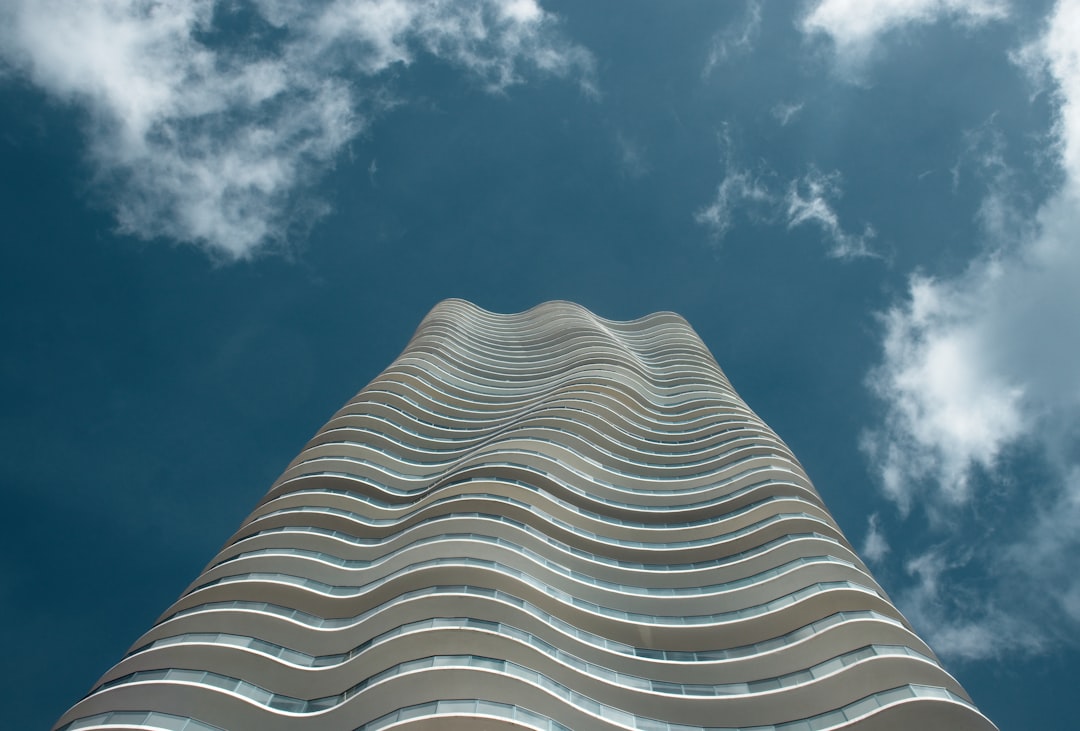 a very tall building with a sky background a very tall building with a sky background