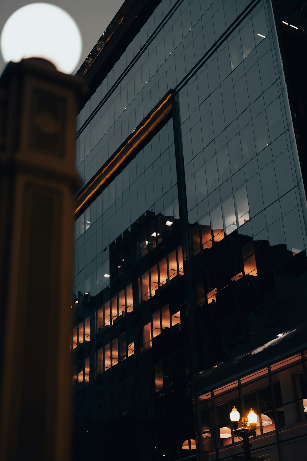 a tall building sitting next to a clock tower