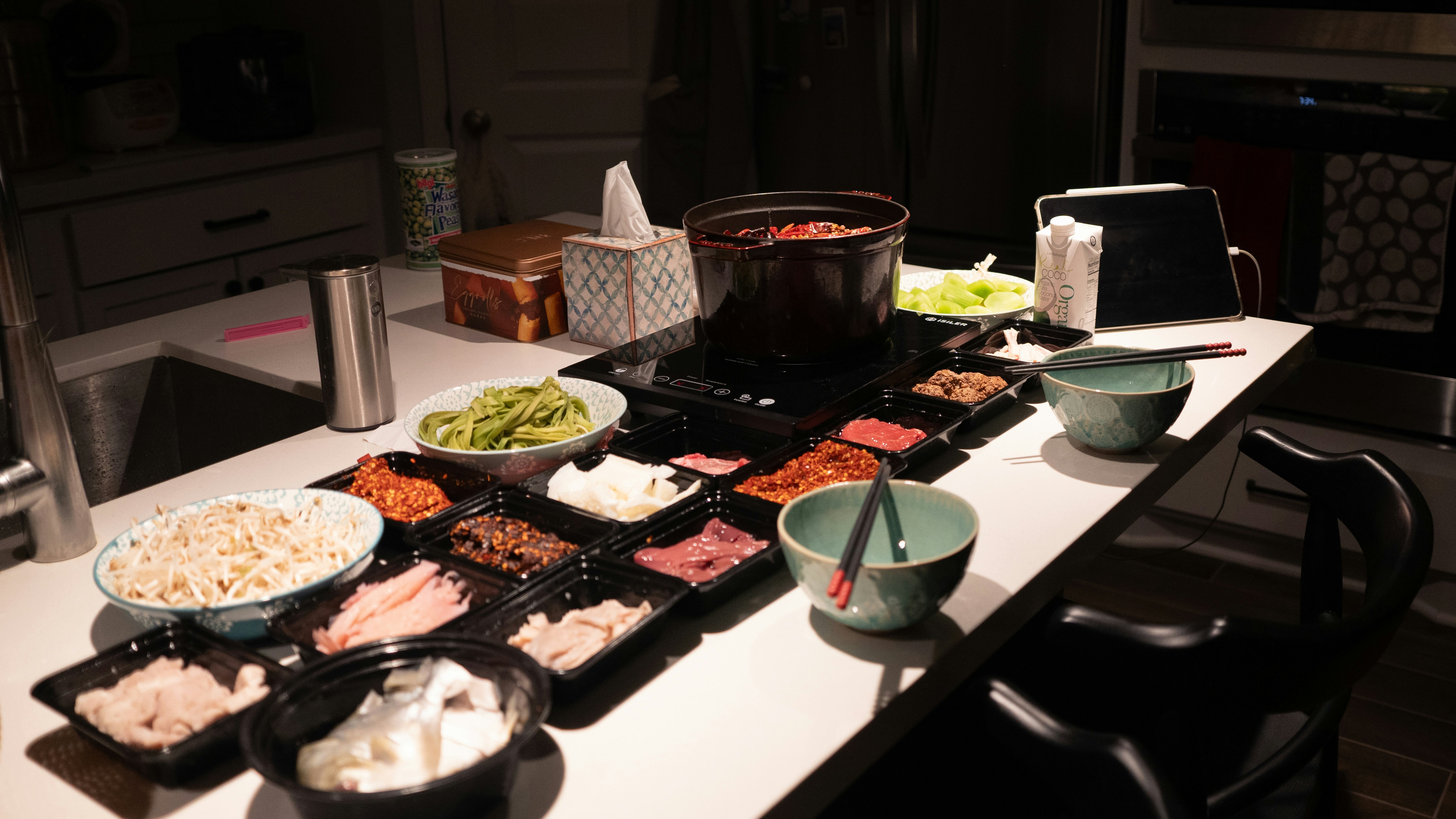 a table topped with bowls and bowls of food