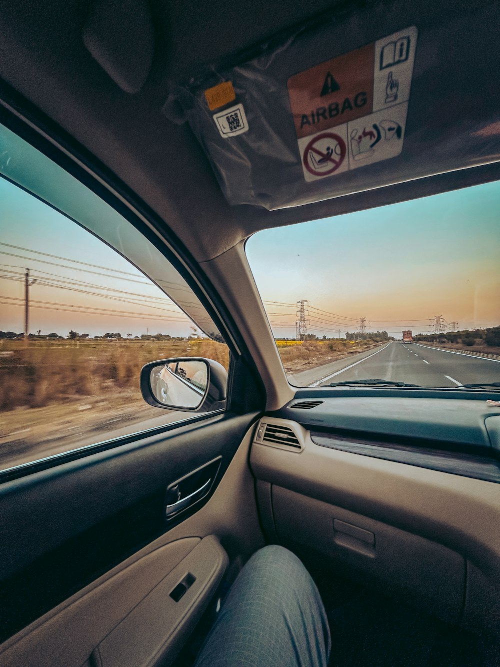 a view of a highway from inside a car
