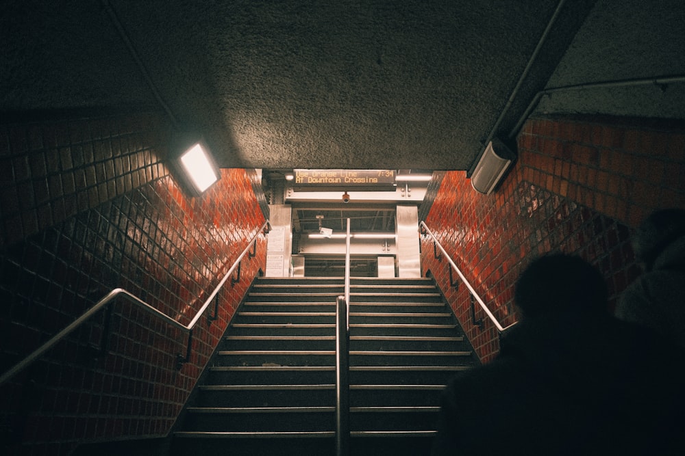 a person walking up a flight of stairs