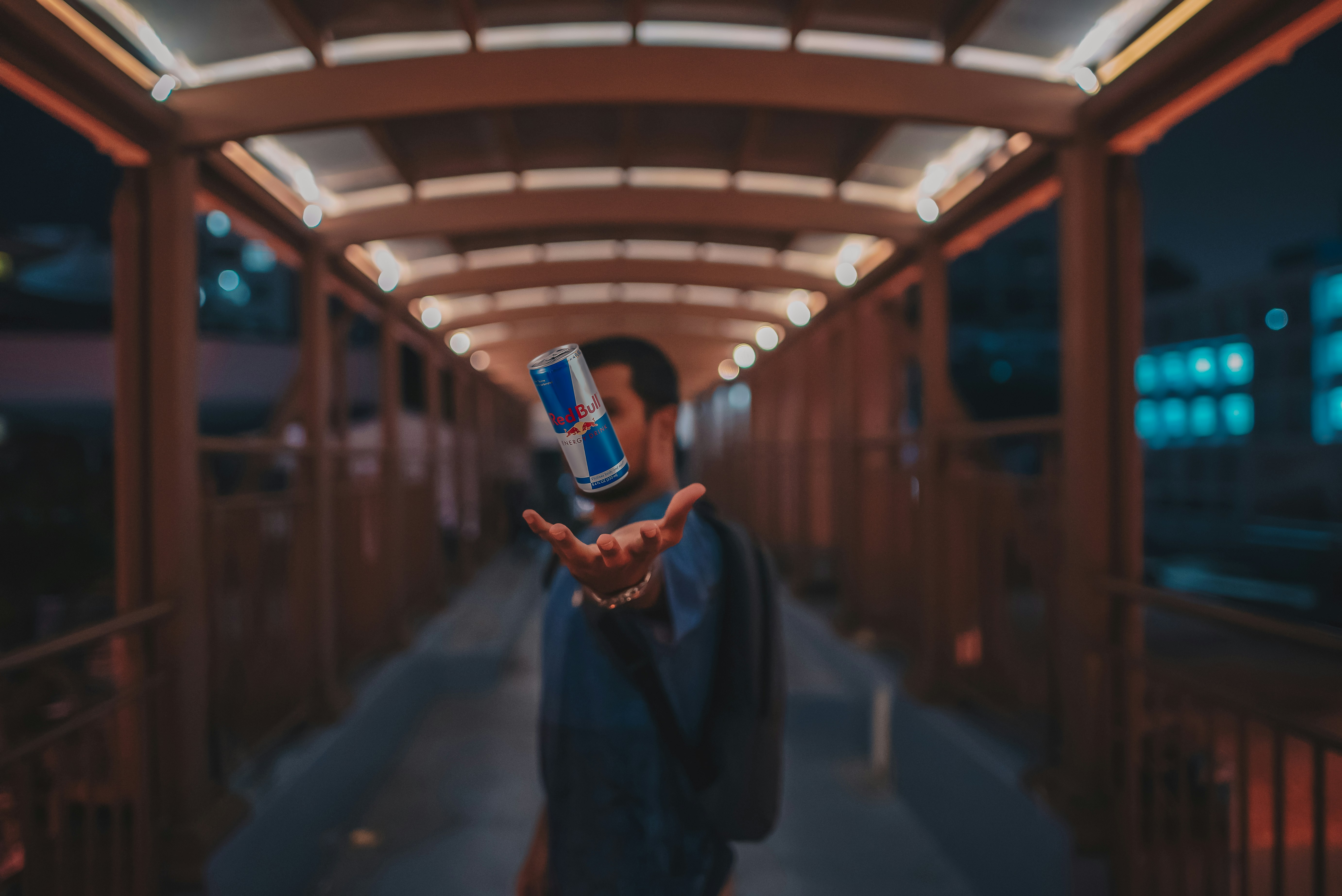 a man holding a cell phone in his hand