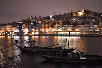 a couple of boats that are sitting in the water
