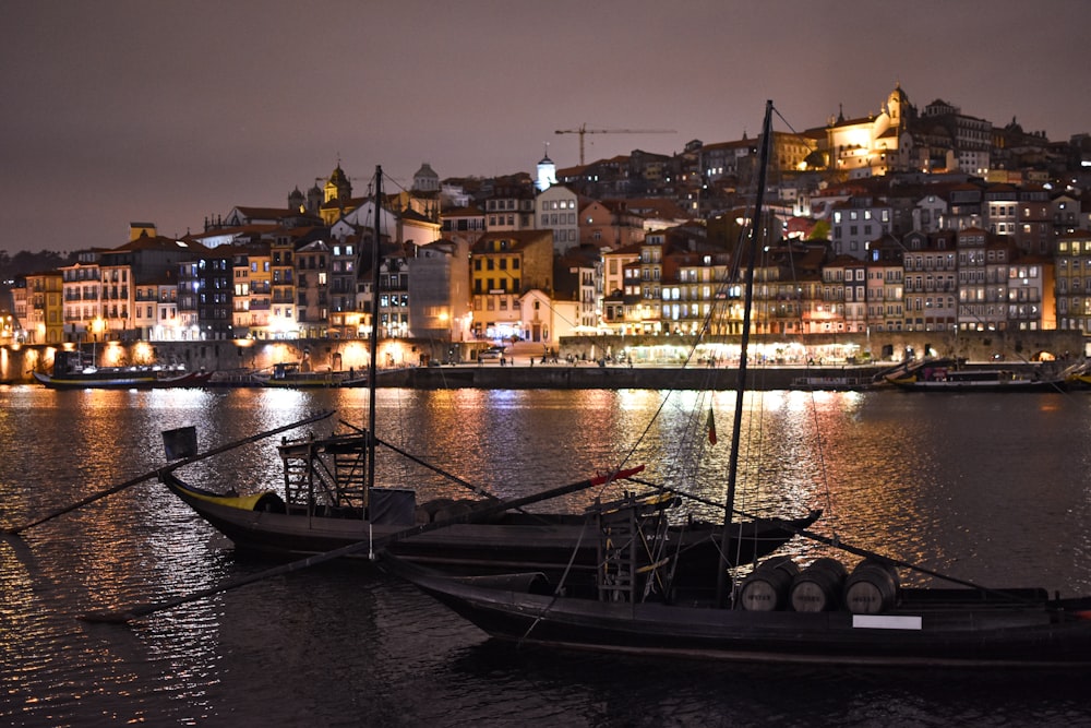 a couple of boats that are sitting in the water