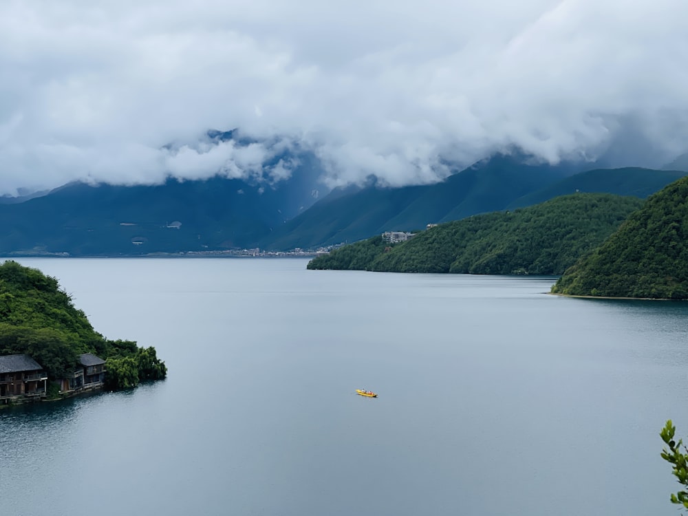 a boat floating on top of a large body of water