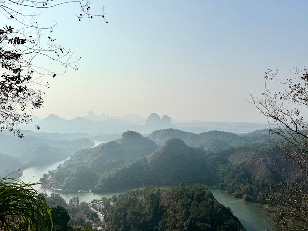 a view of a river running through a valley