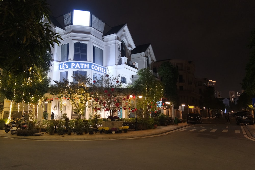 a building with a lit up sign on the front of it