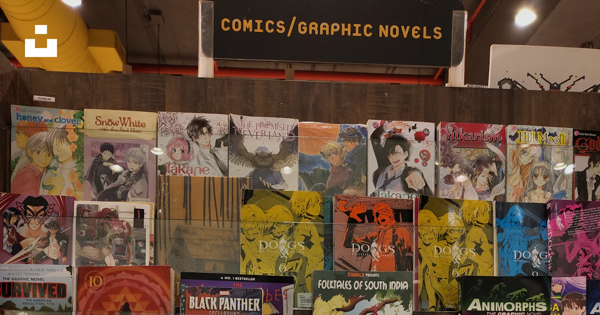 Comic Store Visual Display A display of comics and graphic novels in a store photo – Free Mani ...