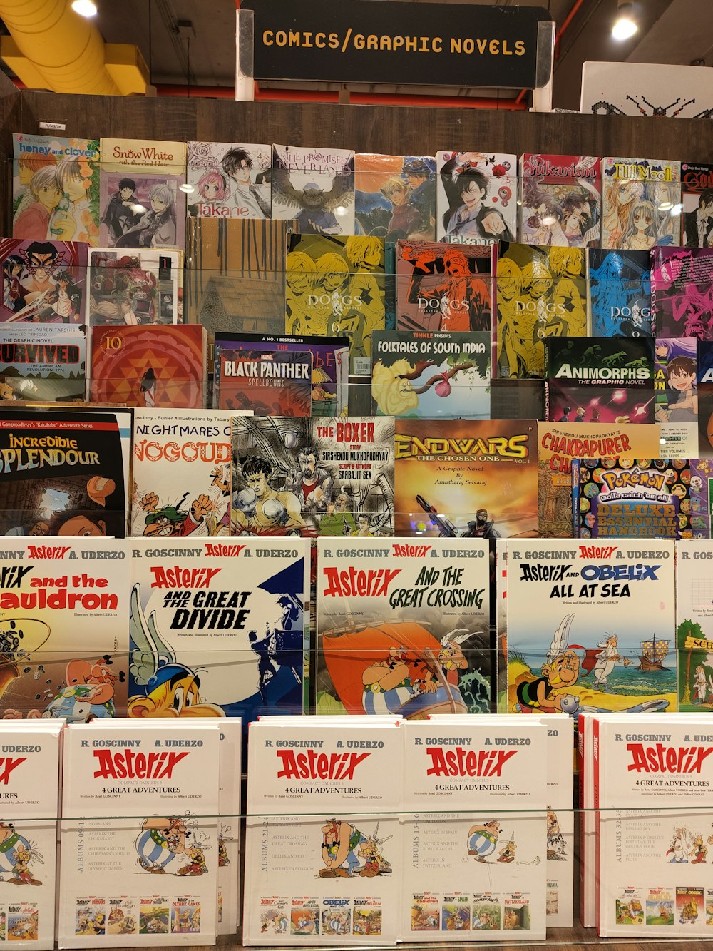 a display of comics and graphic novels in a store