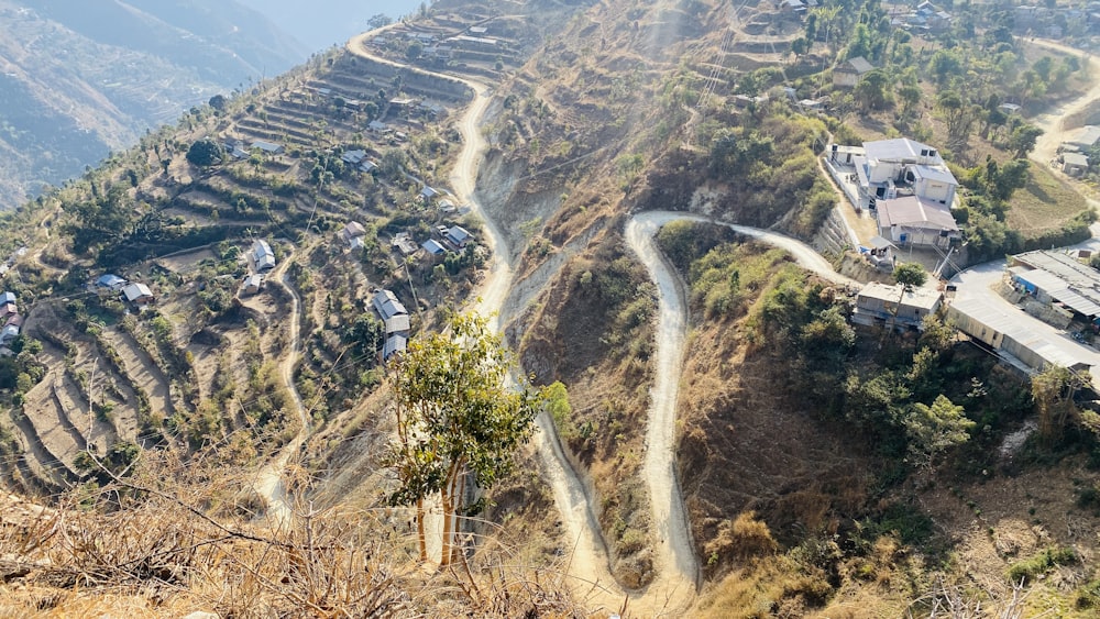 a winding road on the side of a mountain