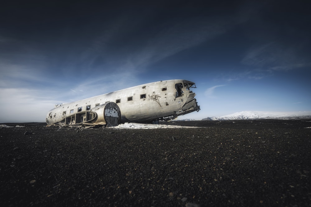 a plane that is sitting in the dirt