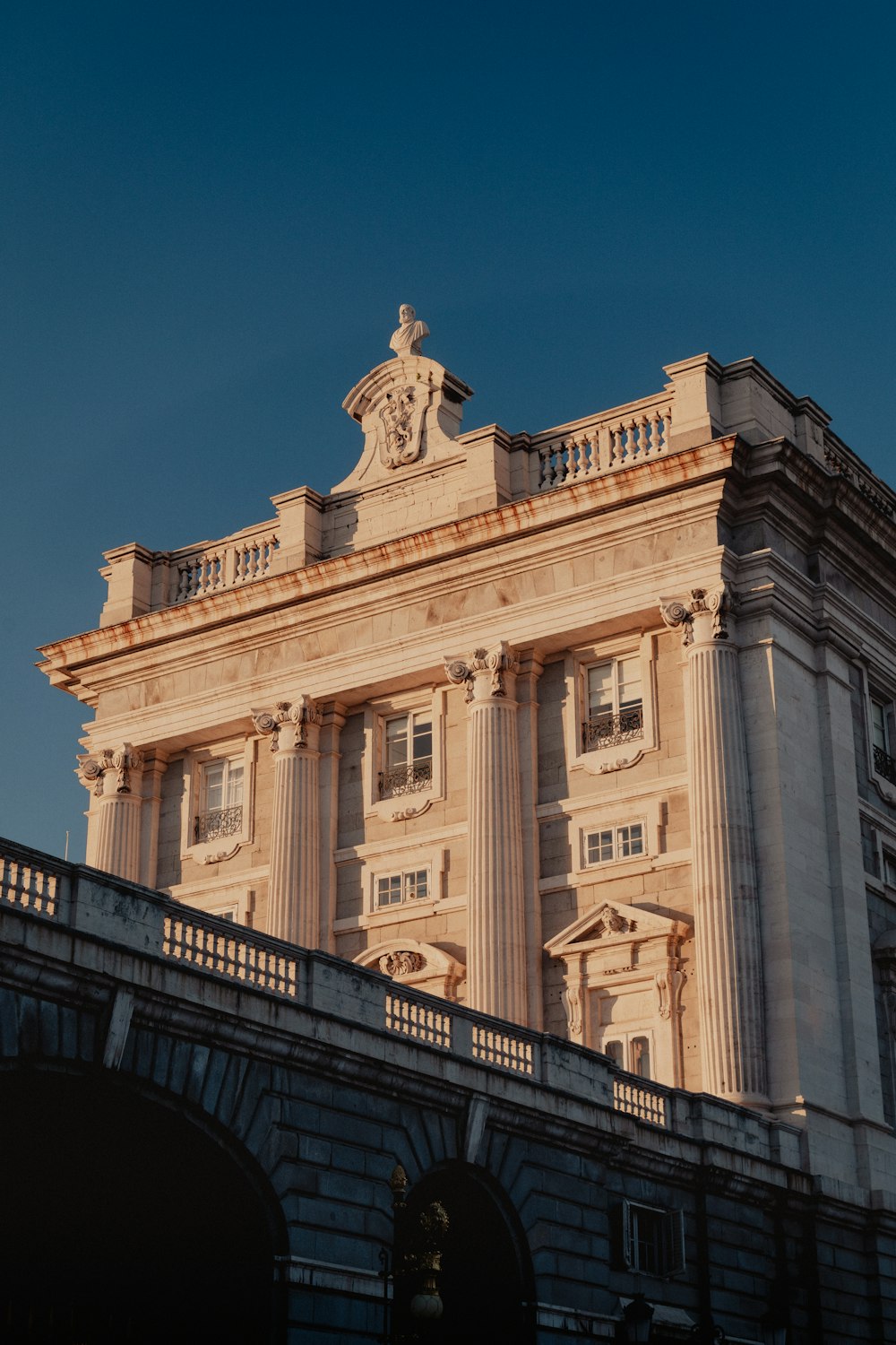 a large building with a clock on top of it