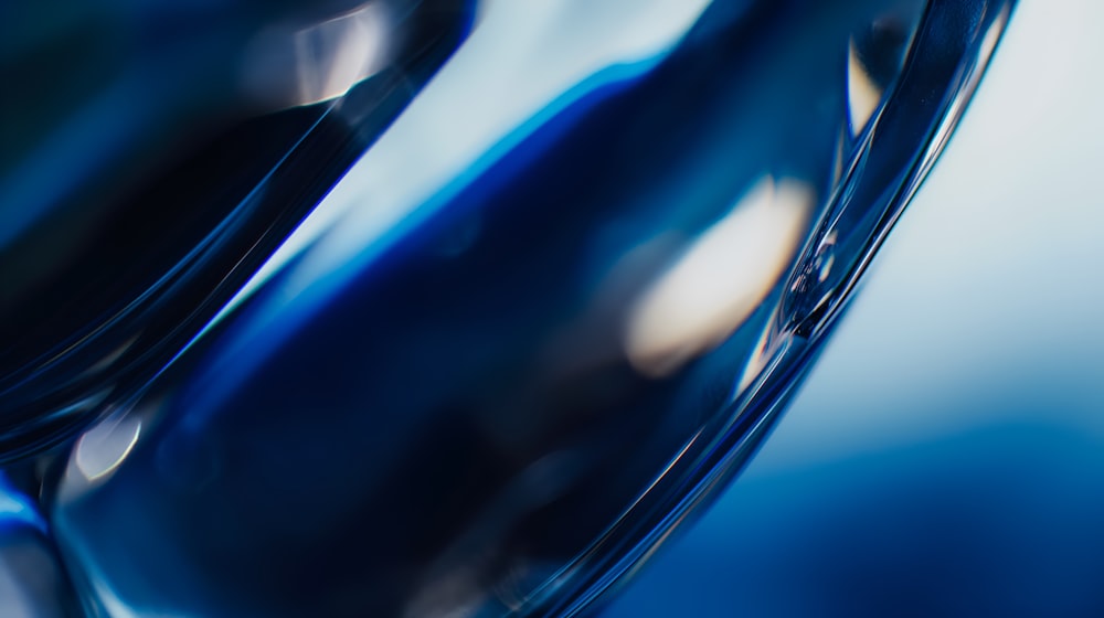 a close up of a blue object with a blurry background