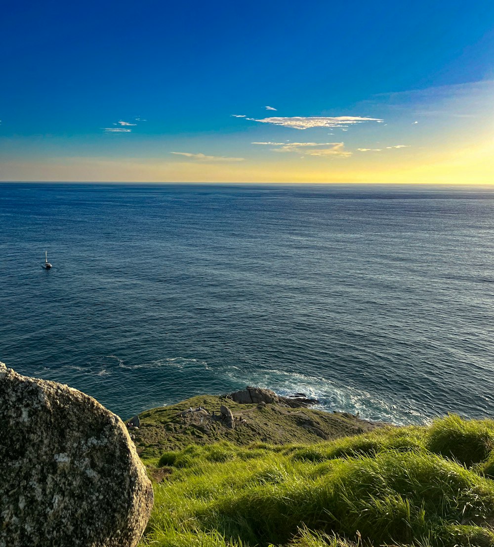 a view of a body of water from a hill