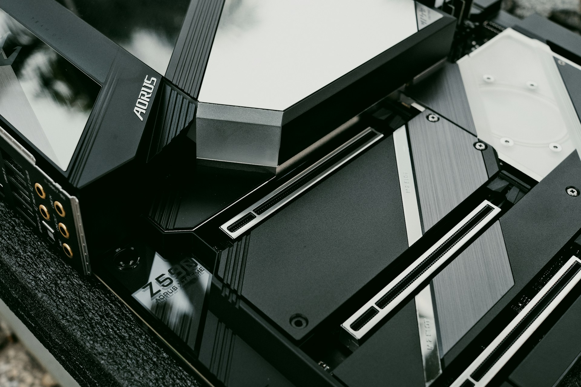 a pile of black and silver electronic equipment