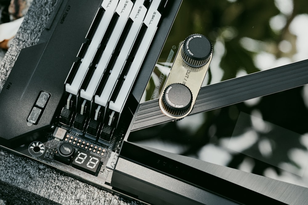 a close up of a black and silver computer