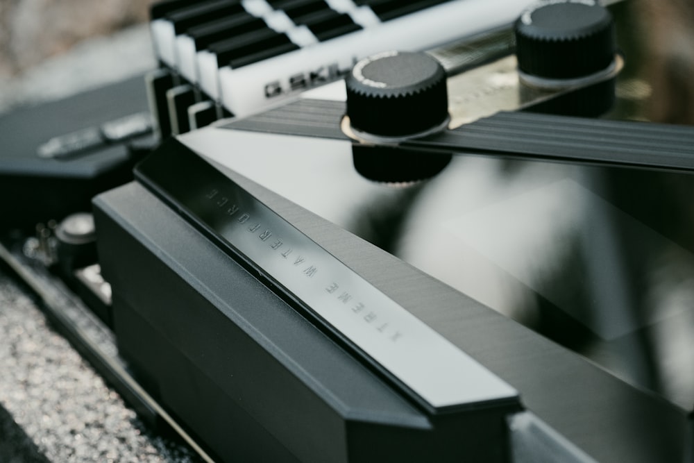 a close up of a black and silver electronic device