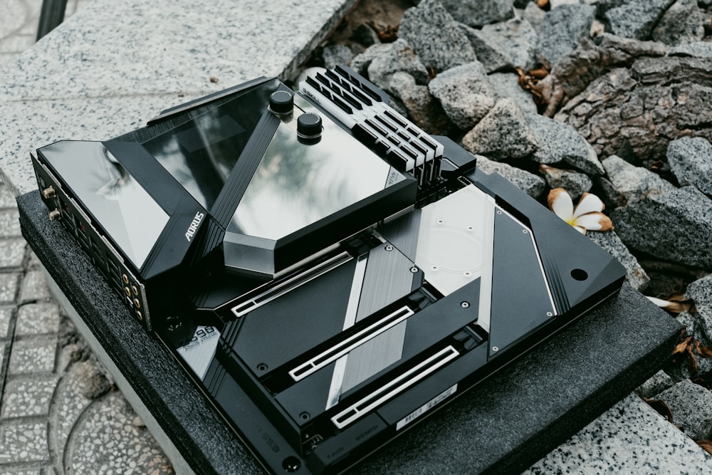 a tablet computer sitting on top of a black case