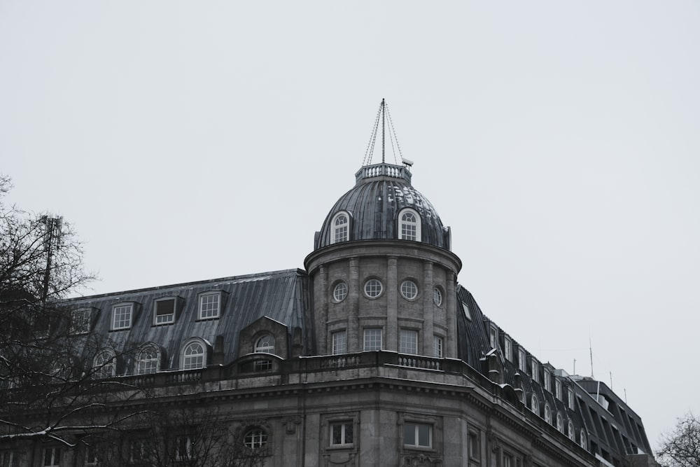 a large building with a clock on the top of it