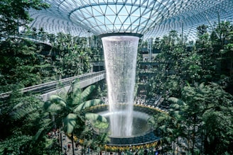 a large waterfall in the middle of a building