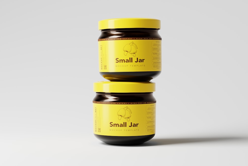 two jars of small jar jam sitting on top of each other