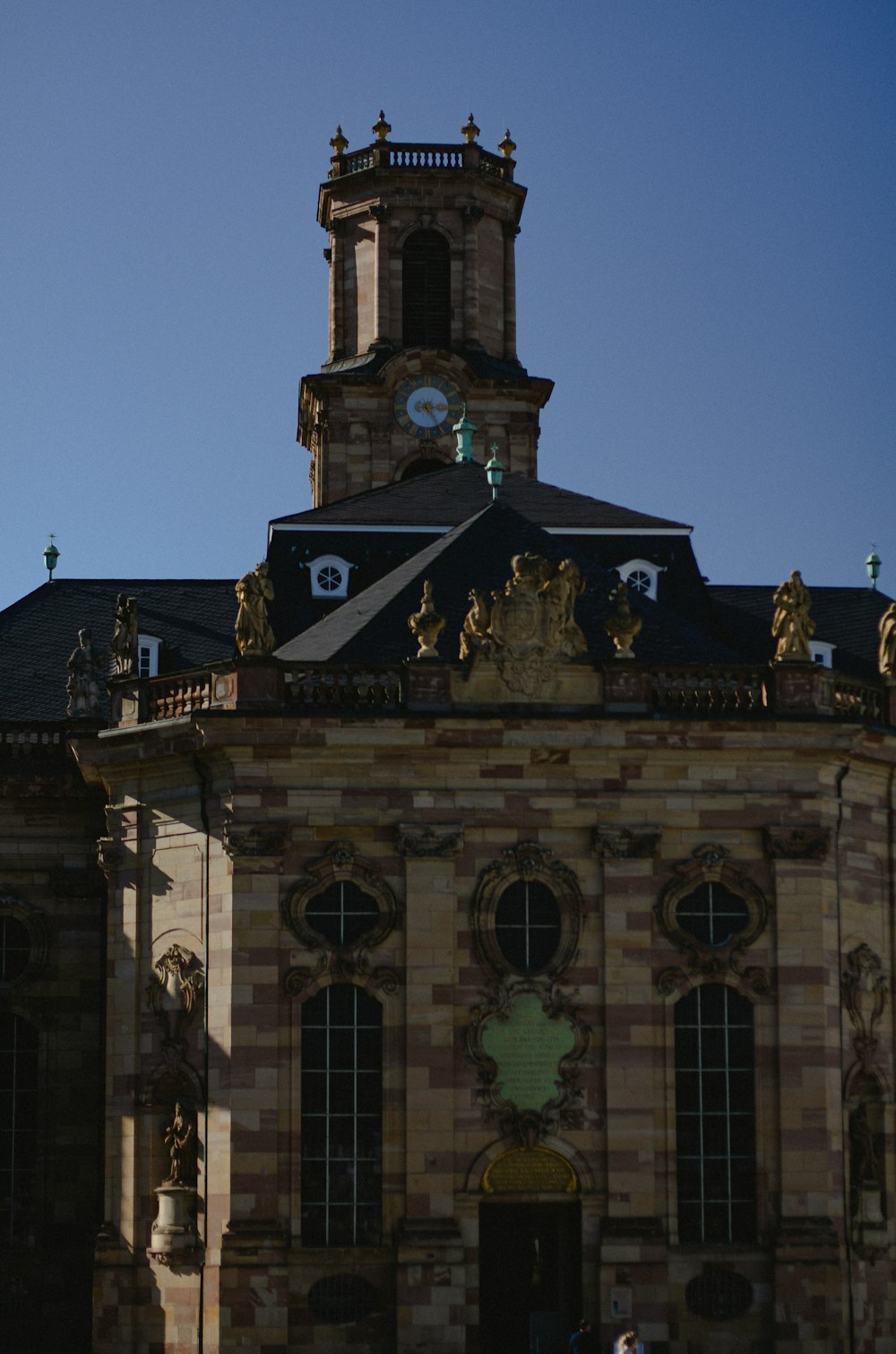 a large building with a clock on the top of it