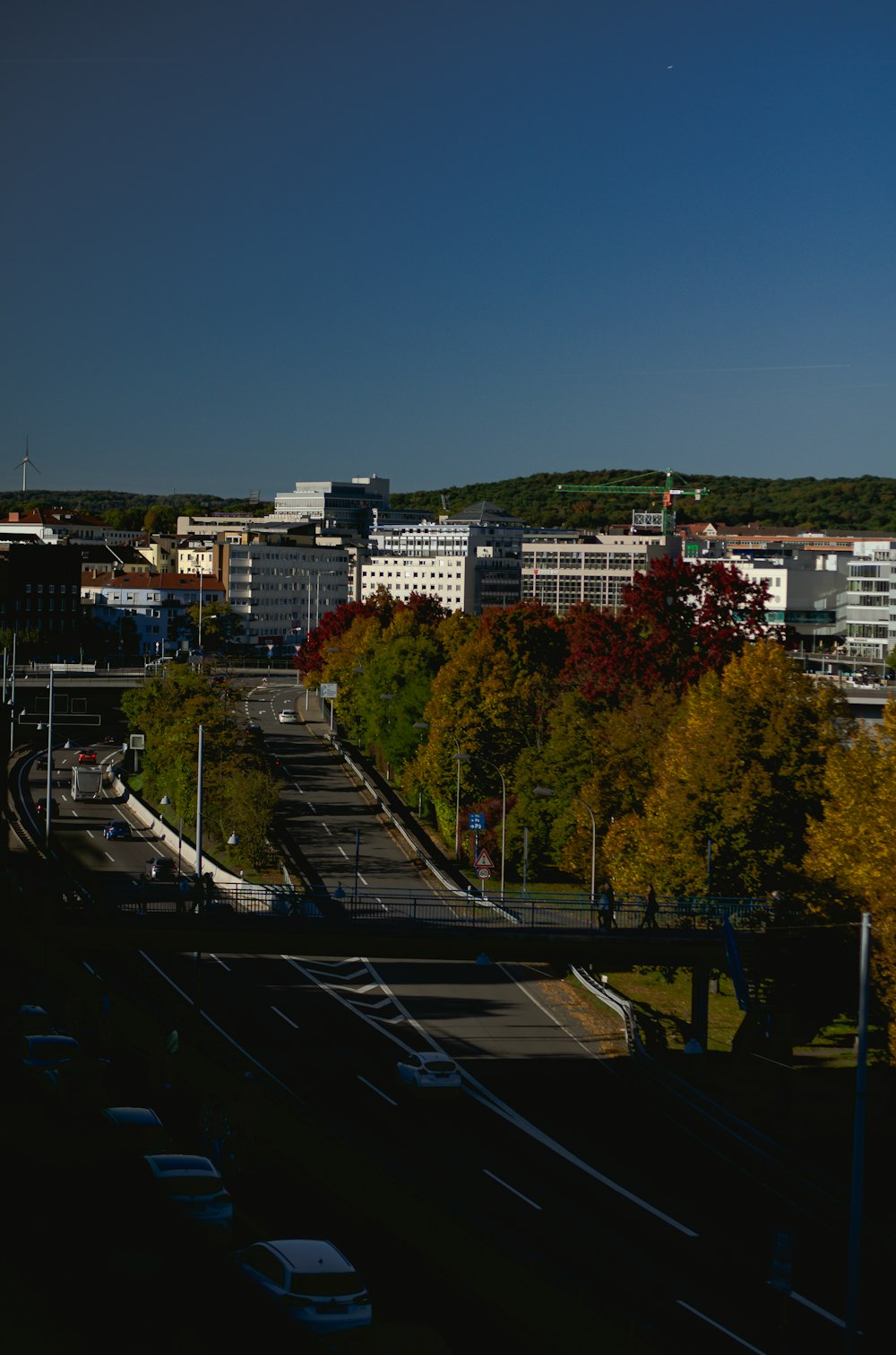 a view of a city from the top of a hill