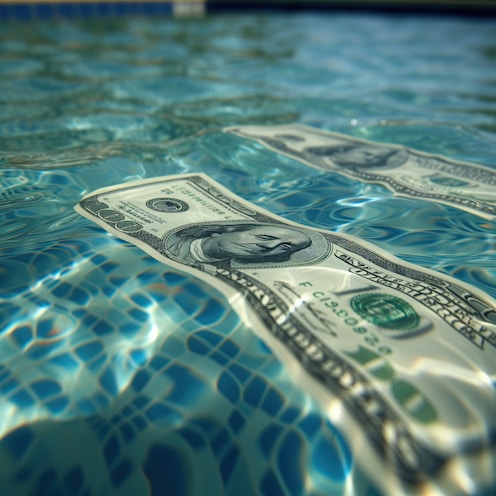 a dollar bill floating in a pool of water
