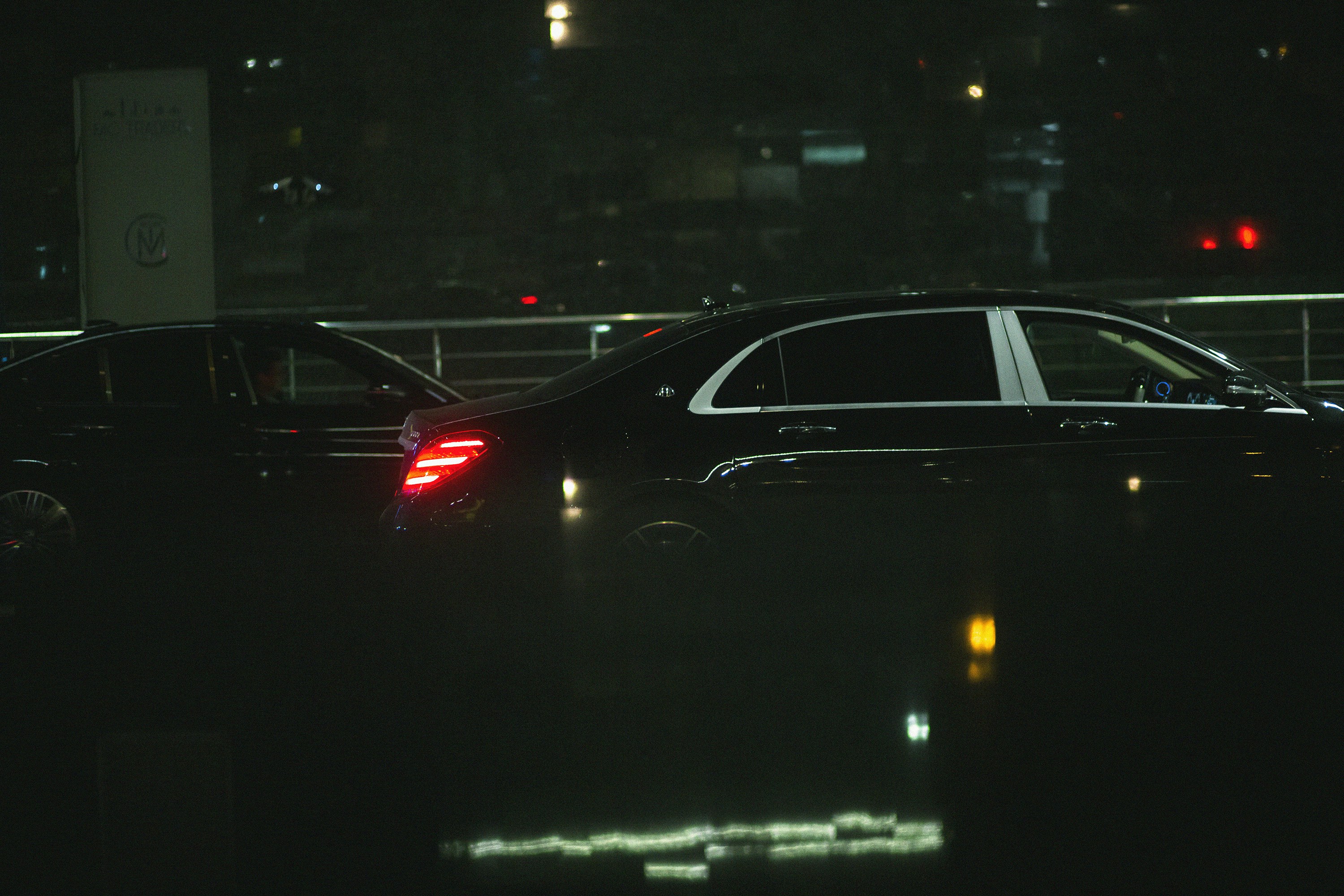 A couple of cars that are sitting in the dark photo – Free Car Image on ...
