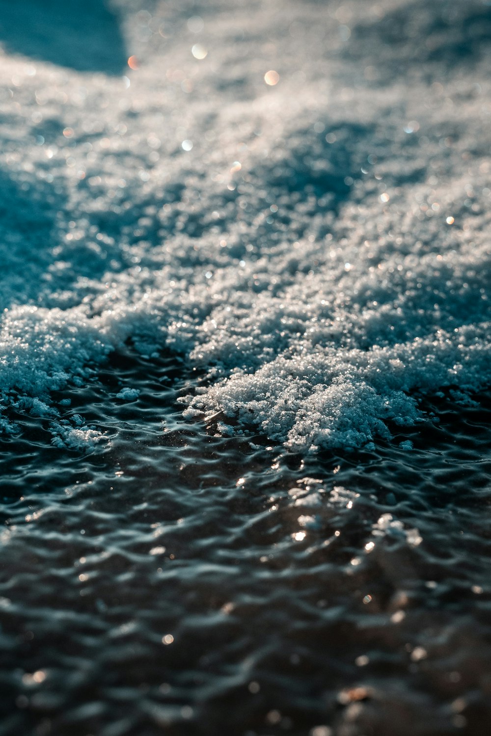 a close up of a wave on the water