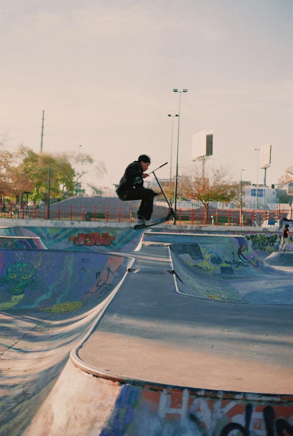 a man riding a skateboard up the side of a ramp